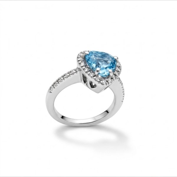 Anello cuore topazio azzurro e contorno in argento 925