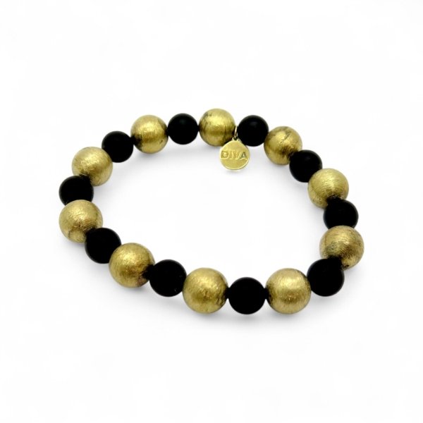 Bracciale elastico sfere onice e placcate oro giallo