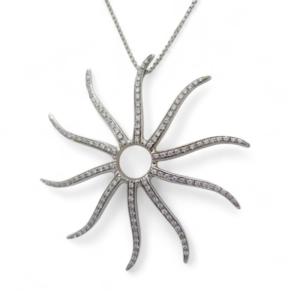 Collana ciondolo sole in oro e diamanti