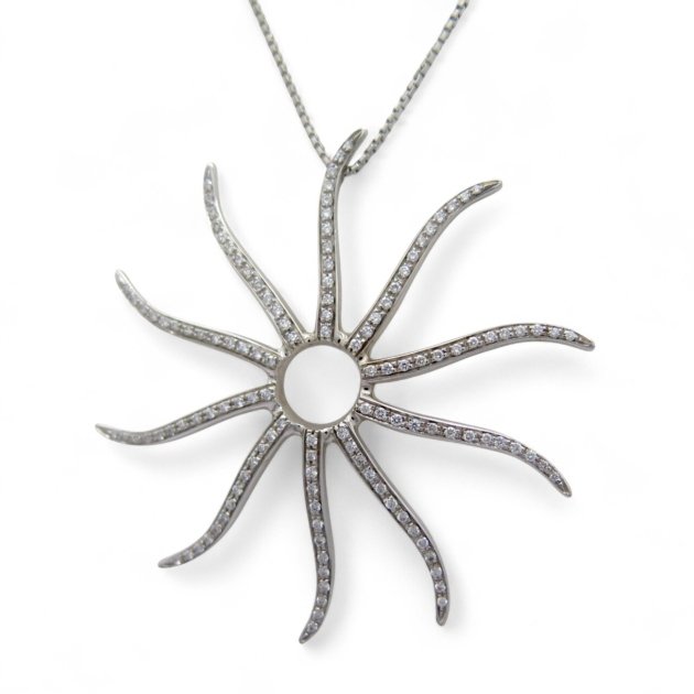 Collana ciondolo sole in oro e diamanti