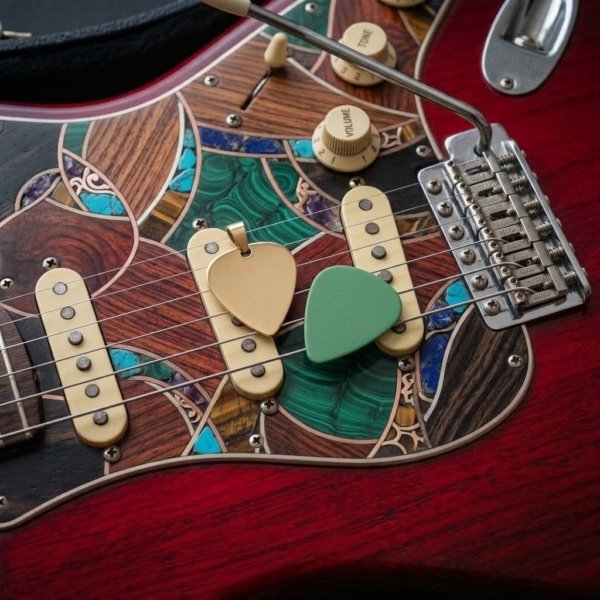 Ciondolo plettro chitarra in oro giallo 18 ct