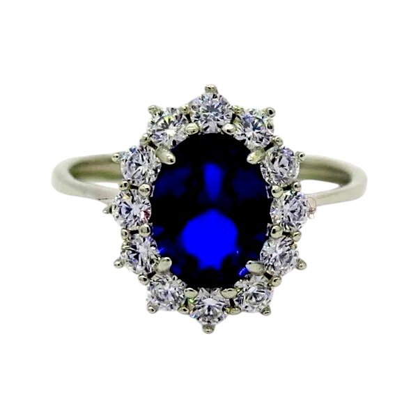 Anello contorno centro blu in oro bianco 18 ct