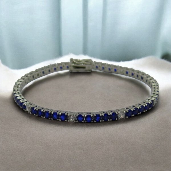 Bracciale tennis pietre blu alternate in argento