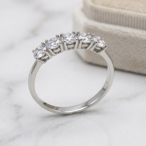 Anello riviera in oro bianco cinque pietre